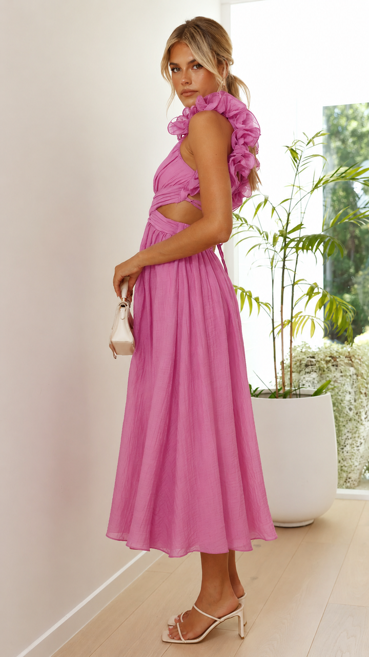 Elegant pink ruffle maxi dress with lace-up back, ideal for wedding guests & special occasions.