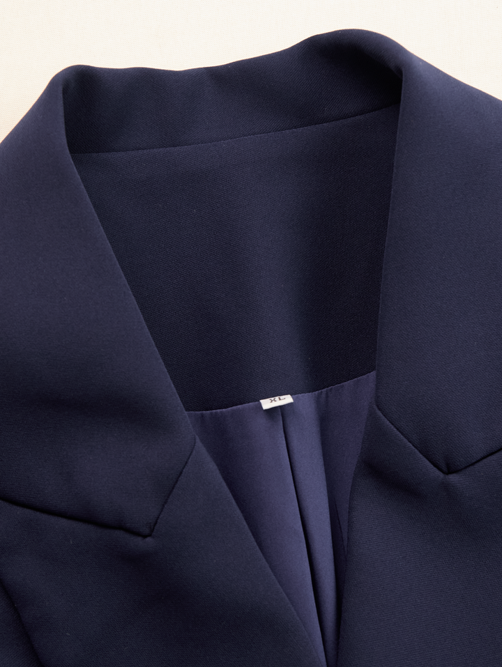 Elegant women's blazer dress, midi length, tailored for a chic look. Perfect as business or cocktail formal wear.
