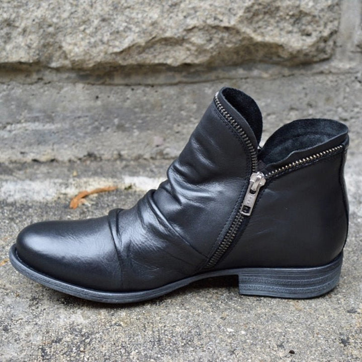 Chic women's autumn ankle boots. Versatile & comfortable footwear for fall fashion, perfect for everyday elegance.