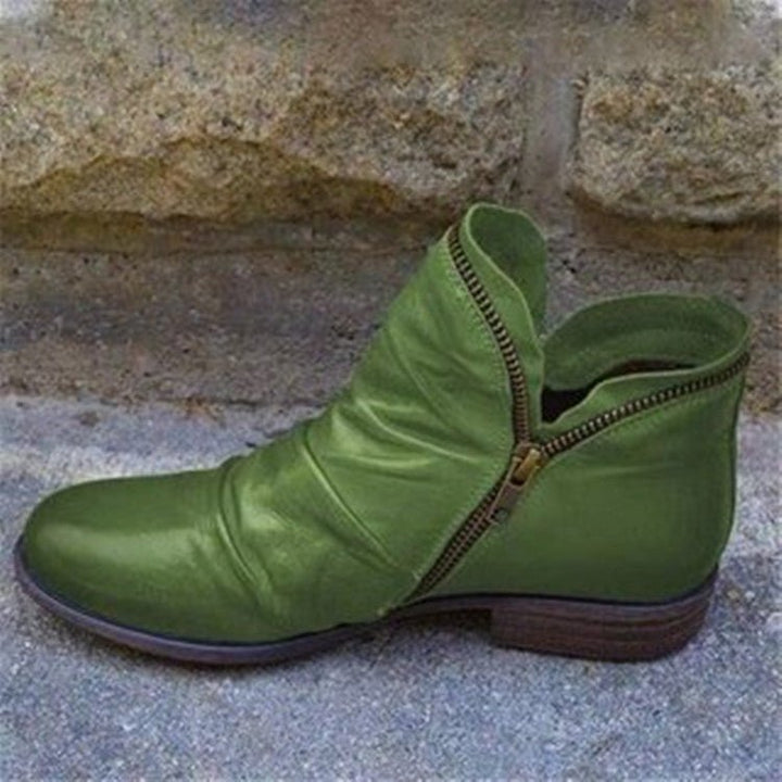 Stylish women's autumn ankle boots. Elegant & comfortable short boots, perfect for versatile fall fashion and chic style.