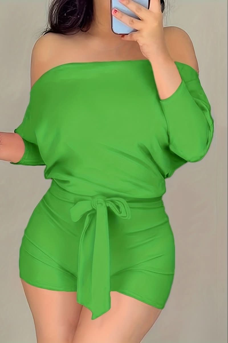 Fashionable women's batwing jumpsuit shorts. A chic, effortless summer outfit & comfortable resort wear.