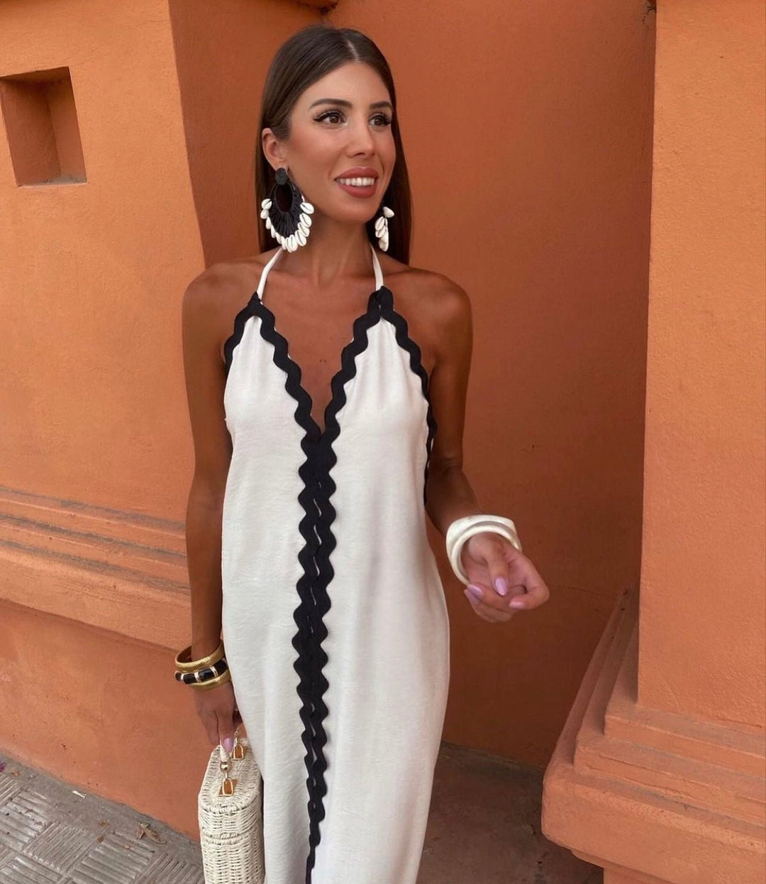 Black and white contrast maxi dress for women, ideal chic wedding guest attire, formal party or special occasion.