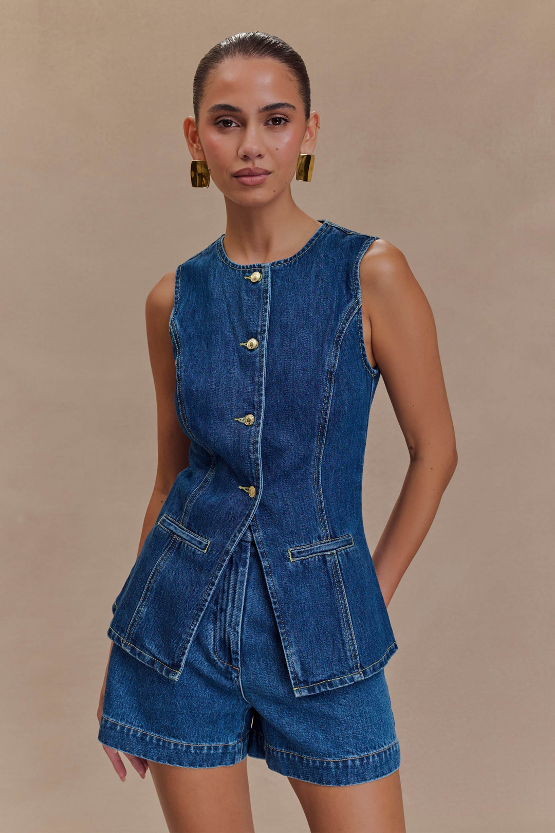 Chic women's blue denim two-piece set, trendy and comfortable for casual wear. Stylish denim fashion outfit.