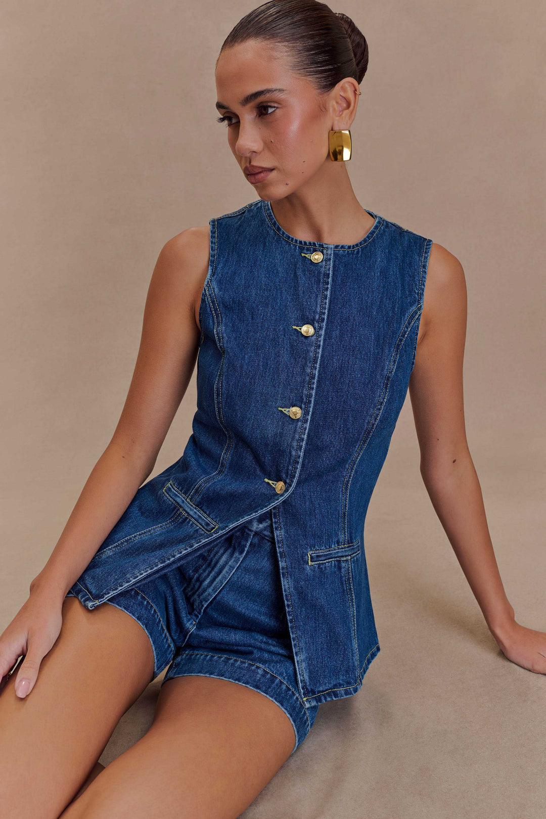 Fashionable women's denim two-piece set. Versatile and comfortable blue denim casual wear outfit for women.