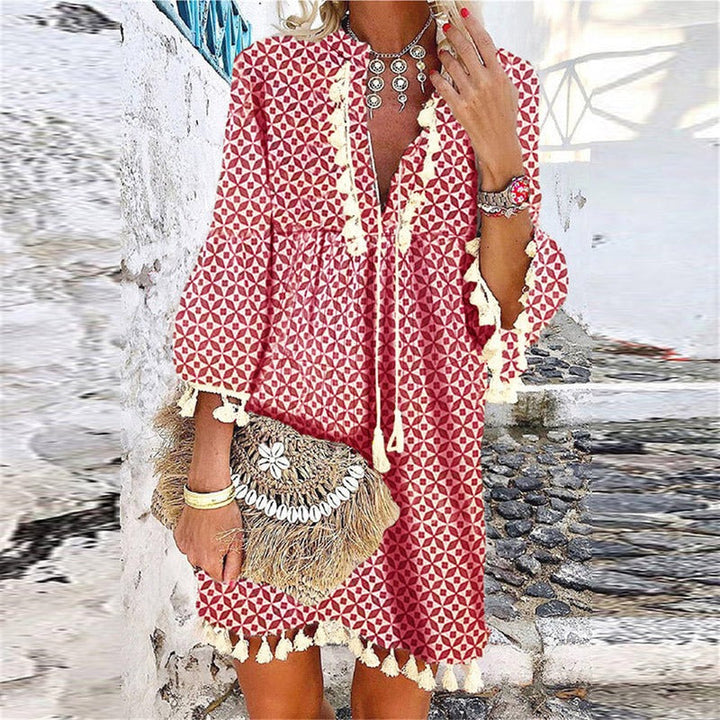 Women's casual boho mini dress with deep V-neck, elegant bell sleeves & decorative tassels for a chic look.