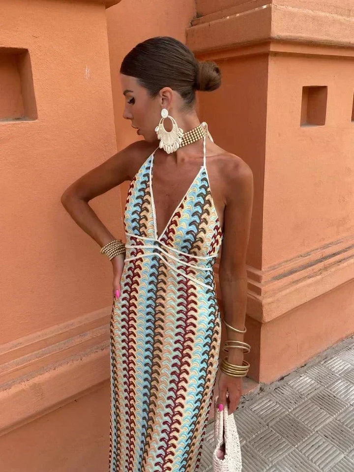 Multicolor printed maxi dress with halter V-neck and open back, a chic boho style for women.