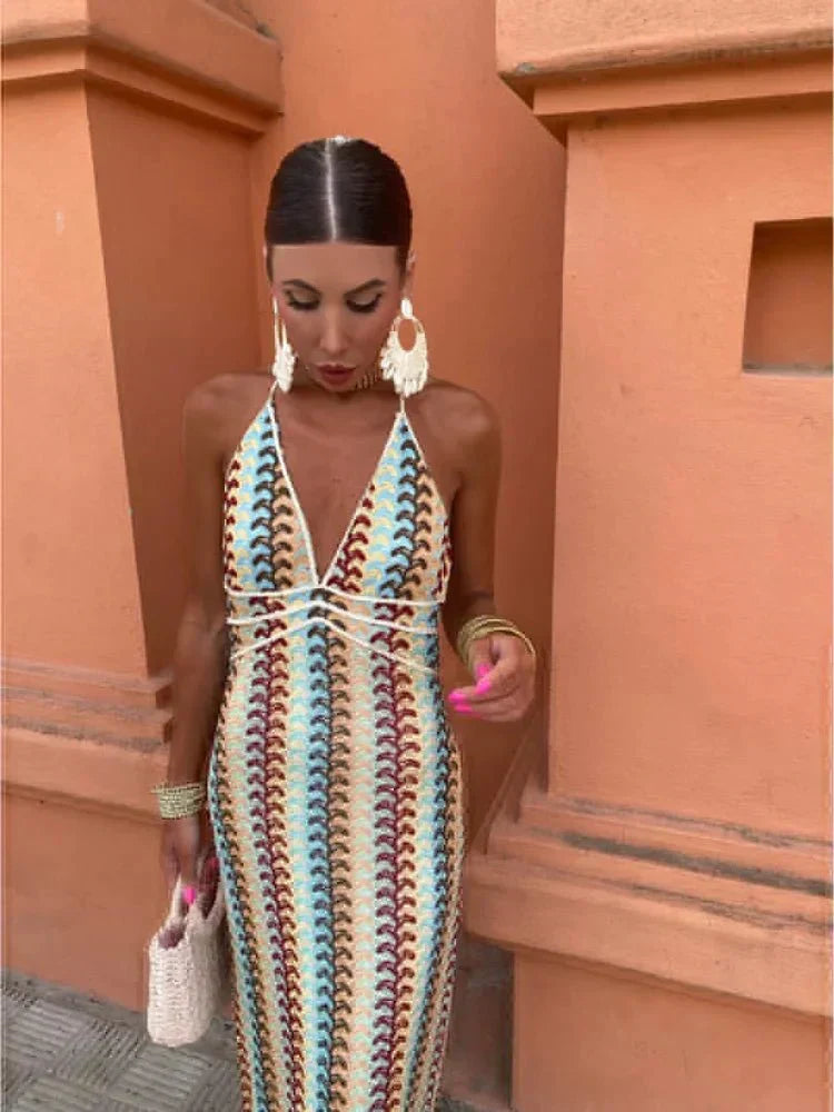 Flowy multicolor printed maxi dress, ideal women's boho wedding guest attire or vacation wear.