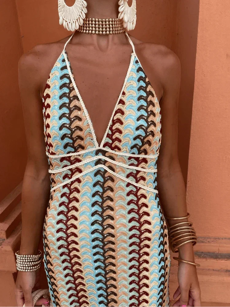 Comfortable chic boho printed maxi dress for women, halter neck, open back, elegant summer party.