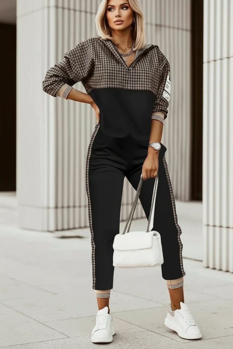 Stylish top of a women's casual tracksuit set, featuring comfortable design for athleisure & everyday wear.
