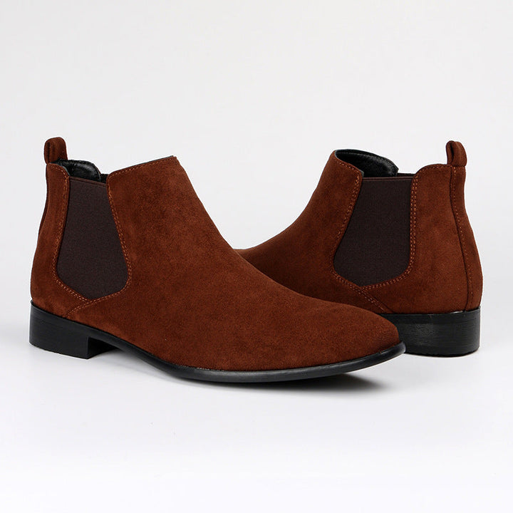Stylish women's black Chelsea ankle boots with a comfortable block heel. Ideal for office, casual & fall fashion.