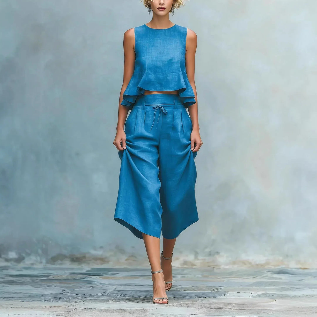 Chic women's crop top & wide leg pant set, perfect for casual chic summer style or elegant travel outfits.