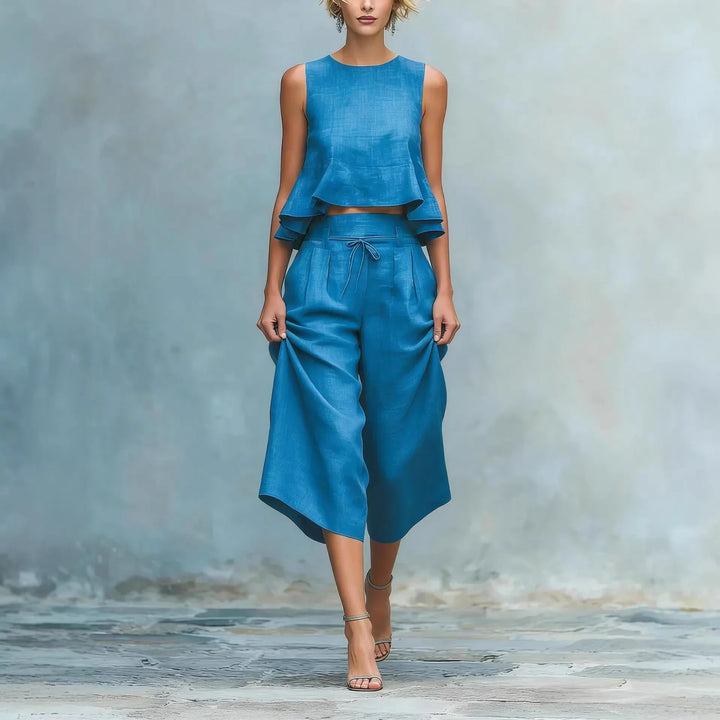 Chic women's crop top & wide leg pant set, perfect for casual chic summer style or elegant travel outfits.