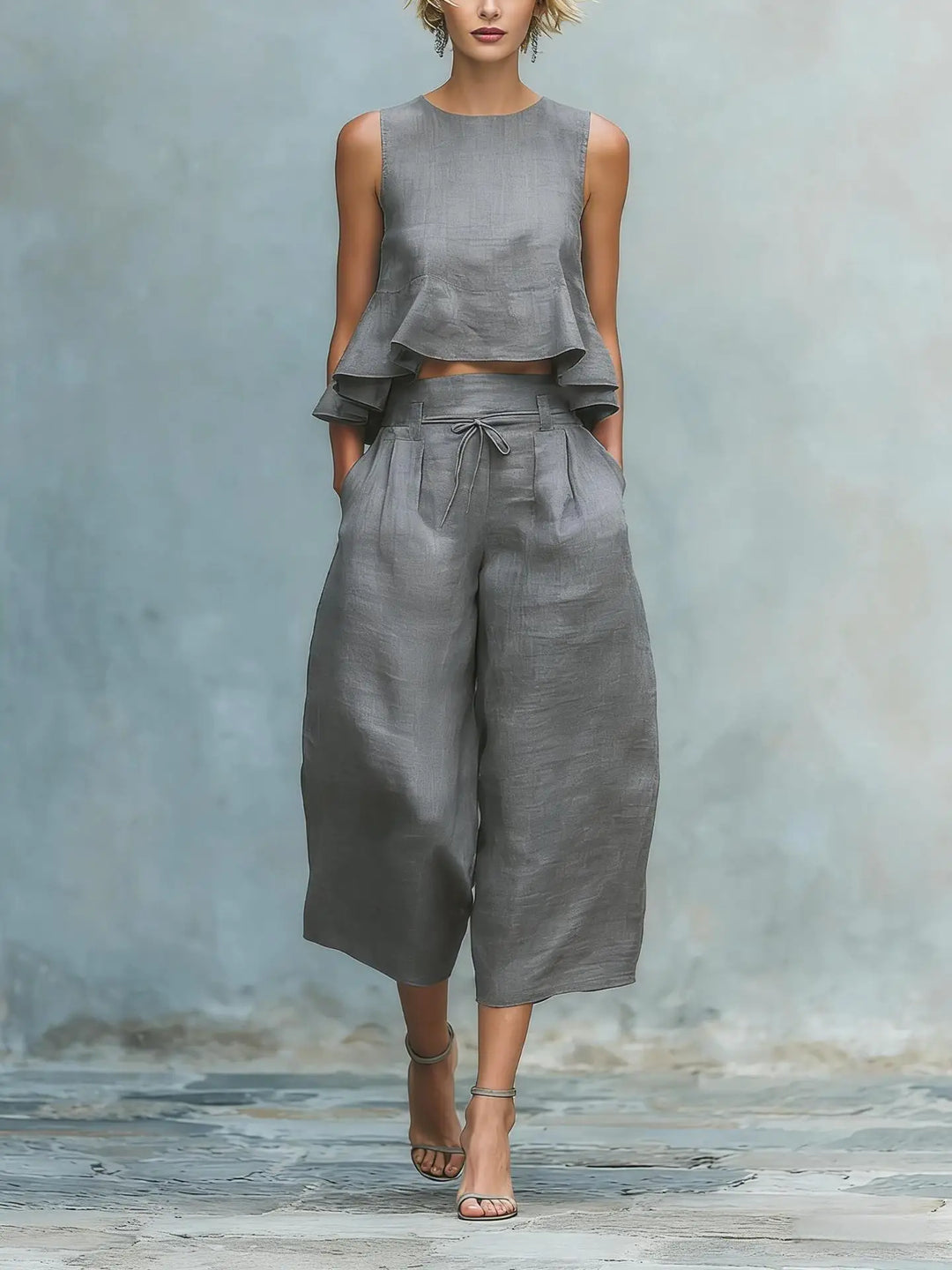 Elegant women's crop top & wide leg pant set. Ideal for comfortable travel, casual chic, or spring daywear.