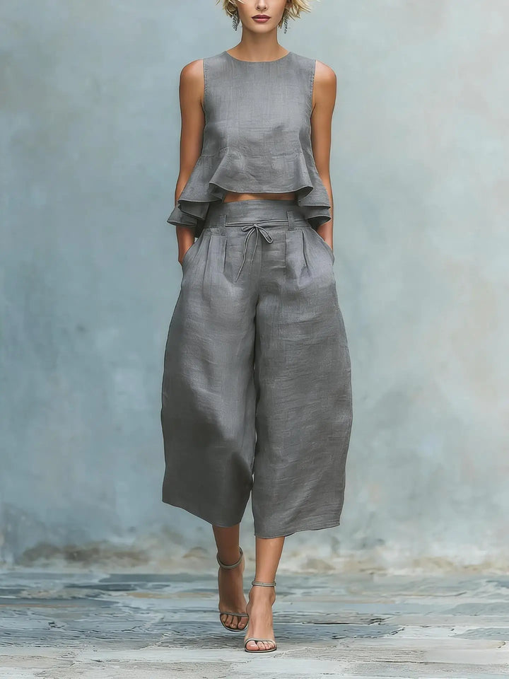 Elegant women's crop top & wide leg pant set. Ideal for comfortable travel, casual chic, or spring daywear.