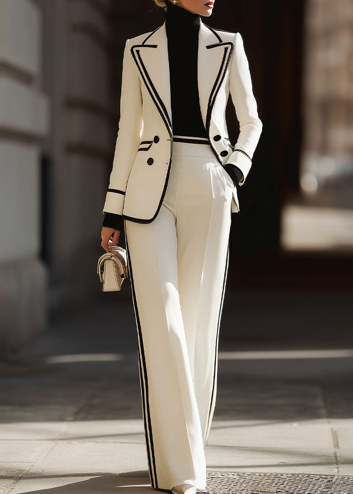 Stylish women's suit set featuring a double-breasted blazer and wide leg pants with elegant contrast trim.