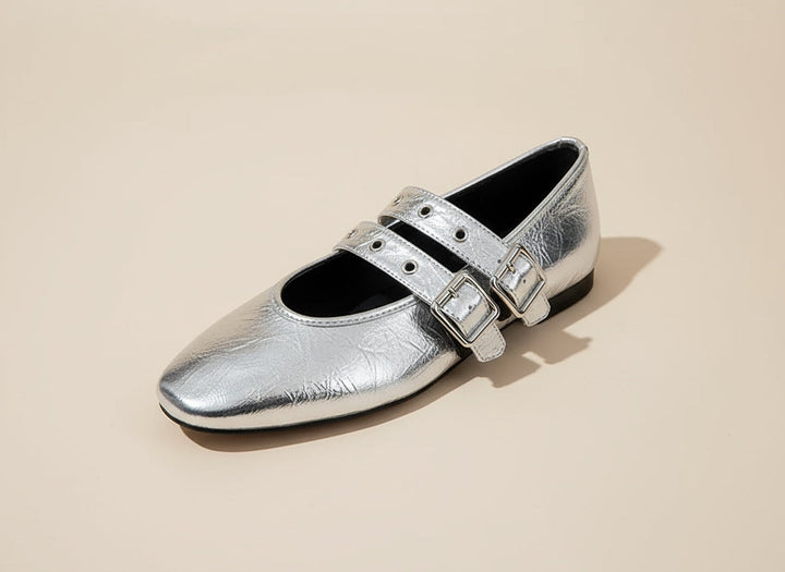 Chic women's double strap buckle flats with an almond toe, perfect for comfortable everyday wear or office style.