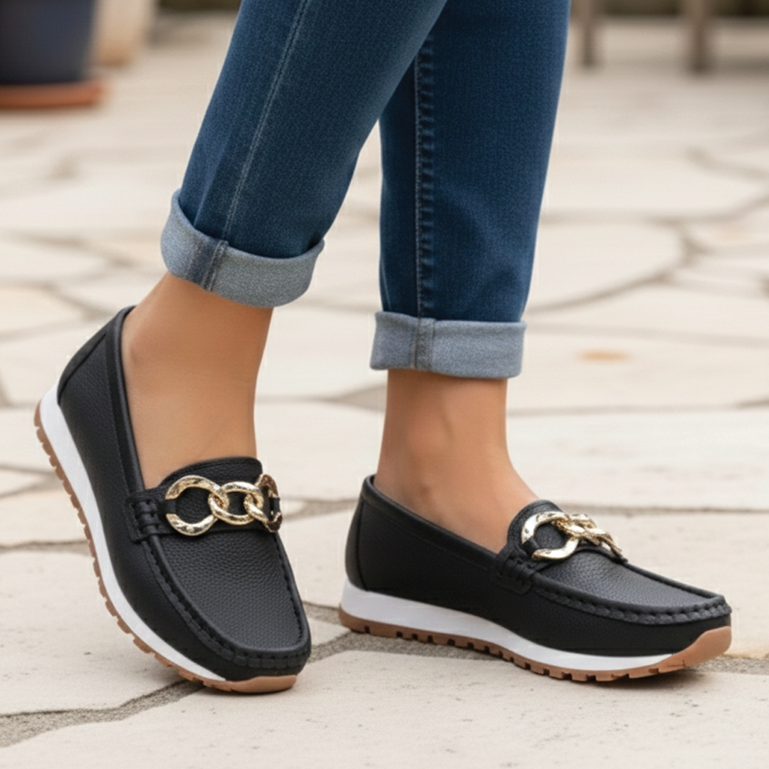 Stylish women's flat loafers with buckle detail, ideal for everyday chic, office or casual fashion footwear.