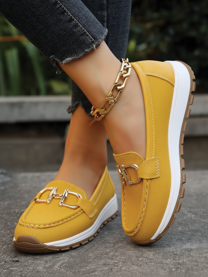 Elegant women's flat buckle loafers, easy slip-on style. Comfortable chic footwear for everyday & office.
