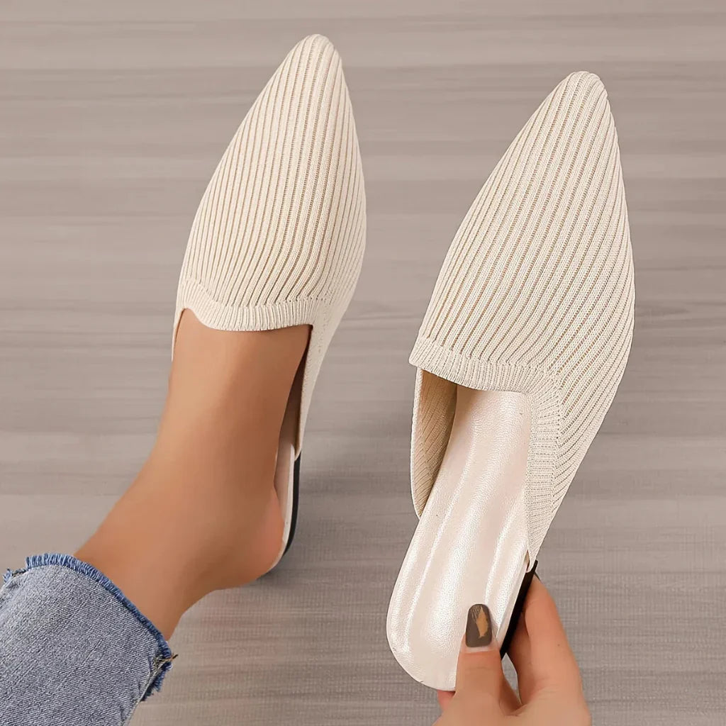 Chic women's flat mules, perfect for comfortable everyday slip-on style. Easy wear casual summer sandals.