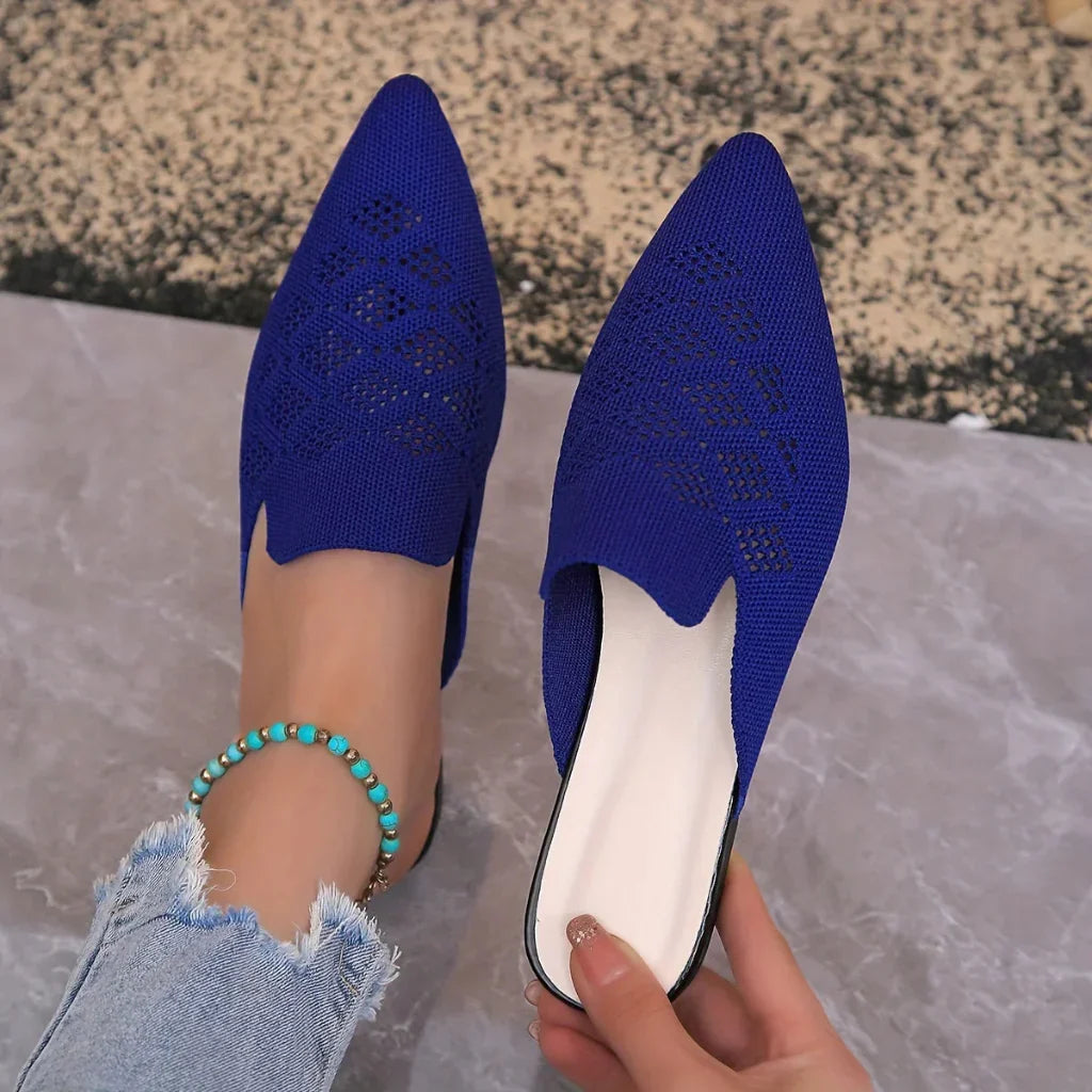 Easy wear women's flat mules, offering comfortable everyday style. Perfect chic slip-on summer footwear.