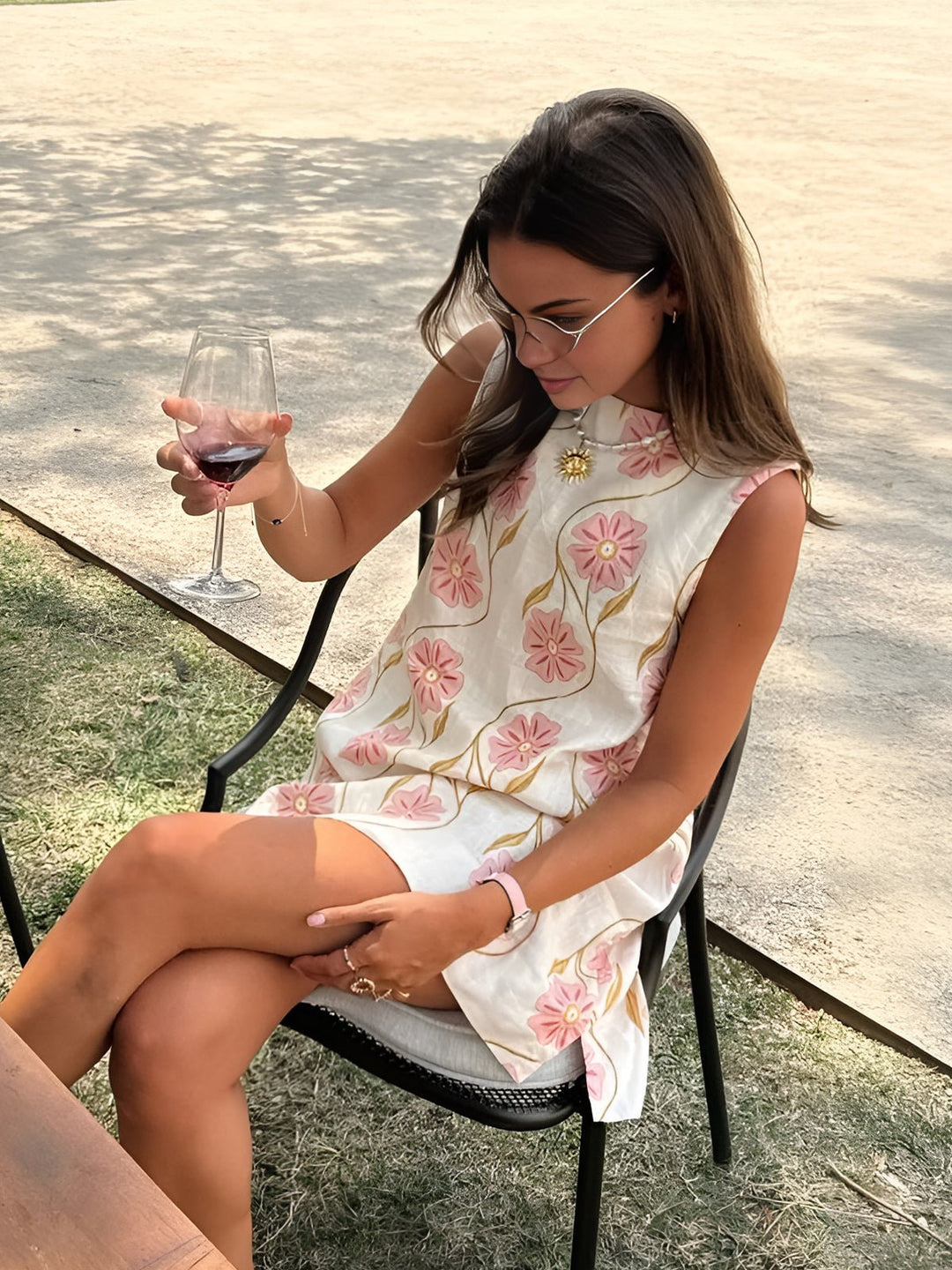 Chic women's floral A-line mini dress with mock neck. Perfect sleeveless summer or spring party dress for elegant style.
