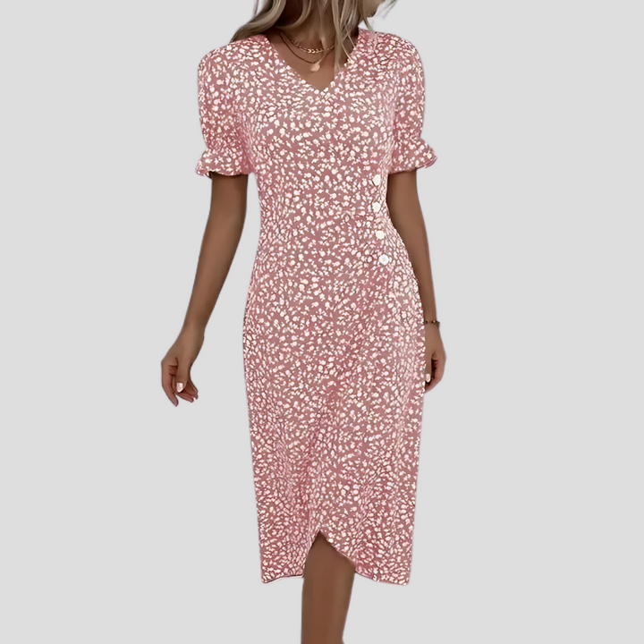 Close-up: button-front, vibrant floral print on women's V-neck midi dress with puff sleeves. Casual summer style.
