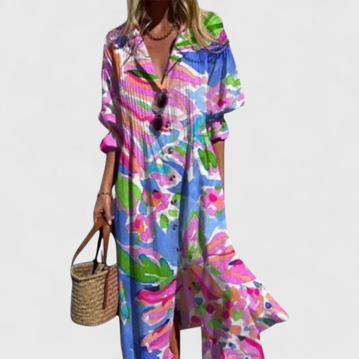 Stylish women's floral summer midi dress with vibrant print, great for vacation, evening, or casual chic resort.