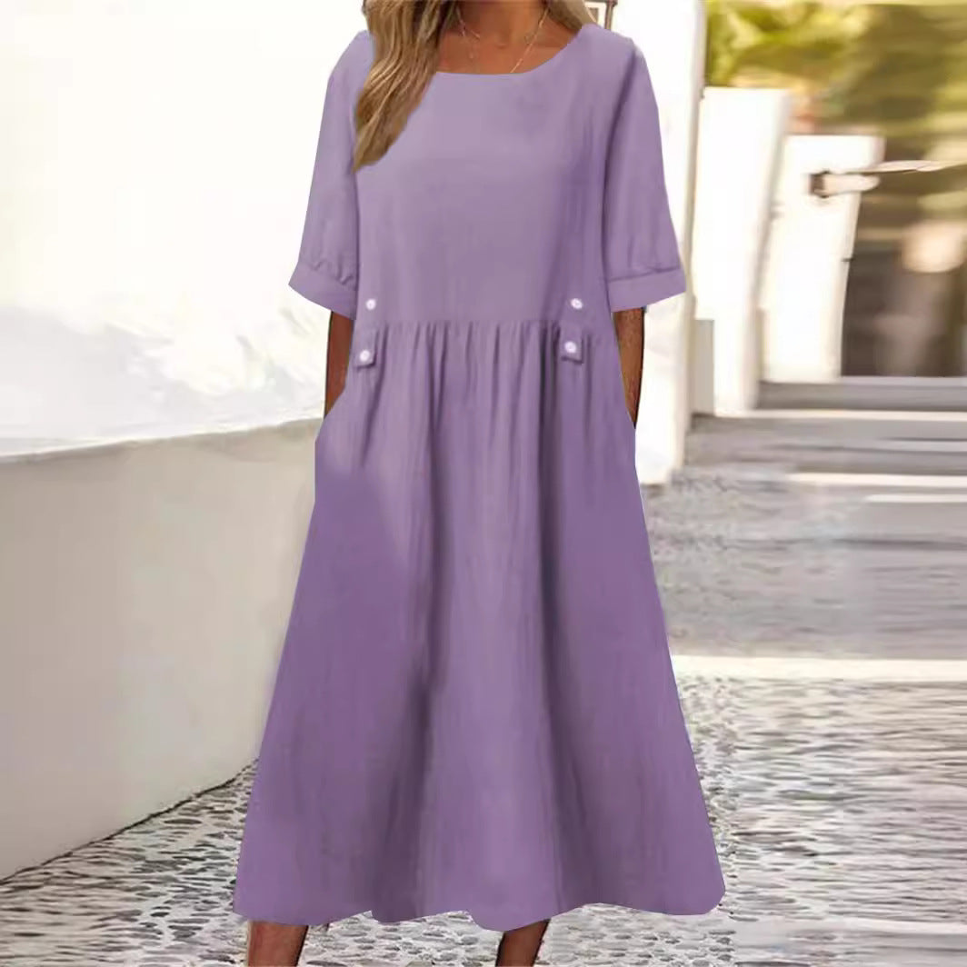 Chic women's flowy summer midi dress with a relaxed fit, round neck, and sleeveless design, perfect for vacation.