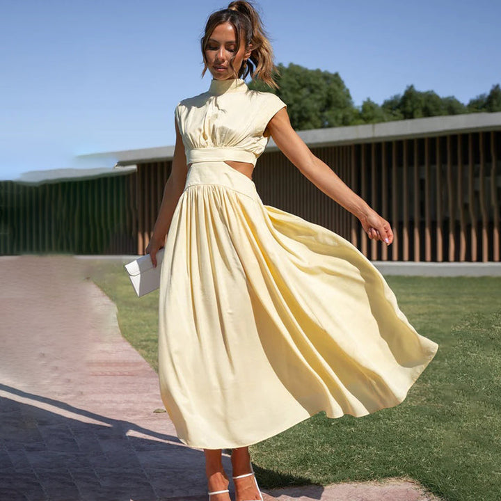 Stunning women's wedding guest dress, midi length with high neck and chic cutout. Elegant A-line.