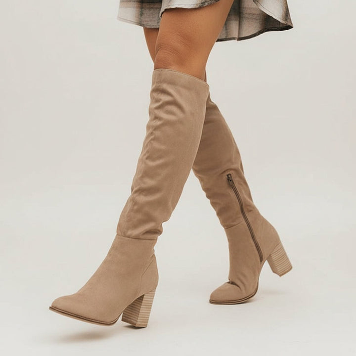 Stylish women's knee-high block heel boots. Pointed toe design, perfect for fall & winter chic everyday wear.