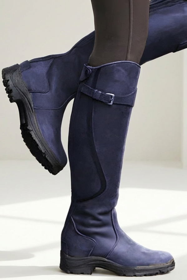 Women's chic knee-high boots, designed for comfort and stability, enhancing any urban fashion look.