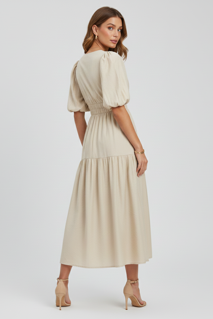 Women's elegant midi dress, V-neck, puff sleeves, ideal for occasion wear. Flattering silhouette.