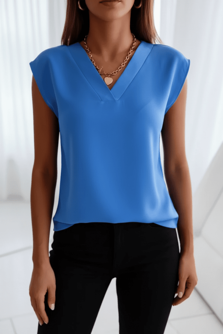 Chic women's open-back going out top, perfect for evening wear. Stylish & flattering sleeveless design.