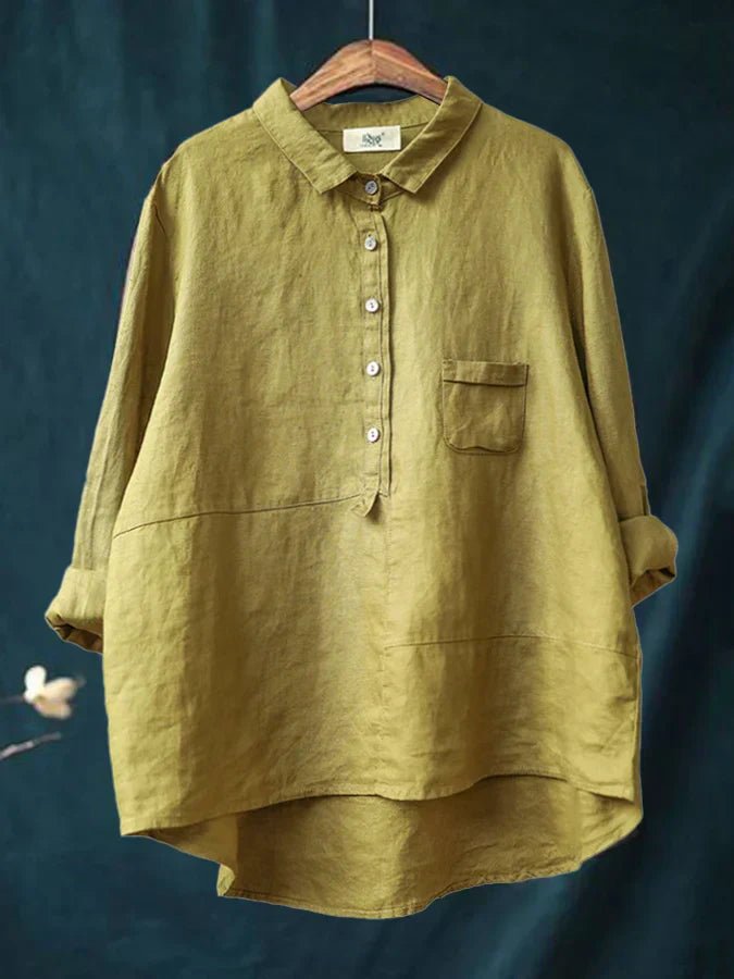 Chic women's oversized button-down shirt with a relaxed fit, perfect for stylish everyday wear.