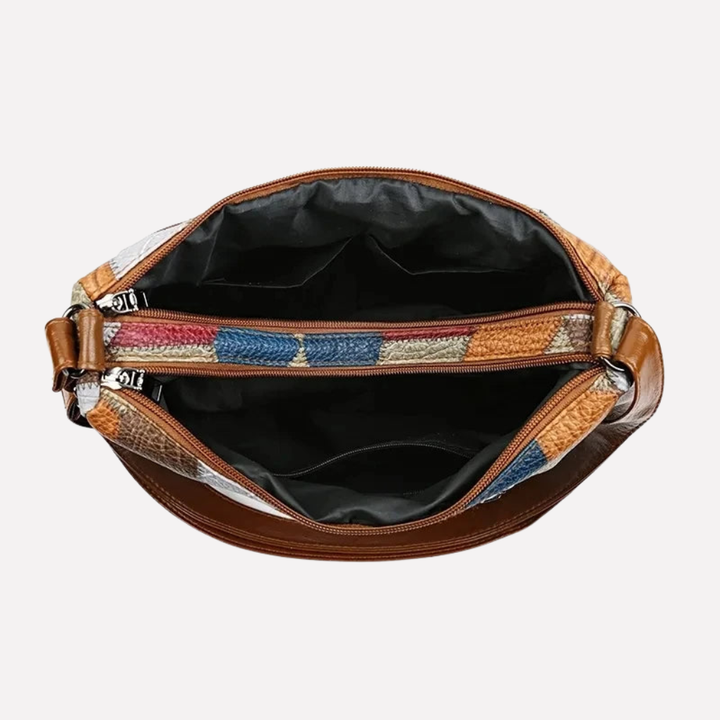 Unique women's patchwork shoulder bag featuring elegant braided detail. A chic & practical fashion accessory for her.