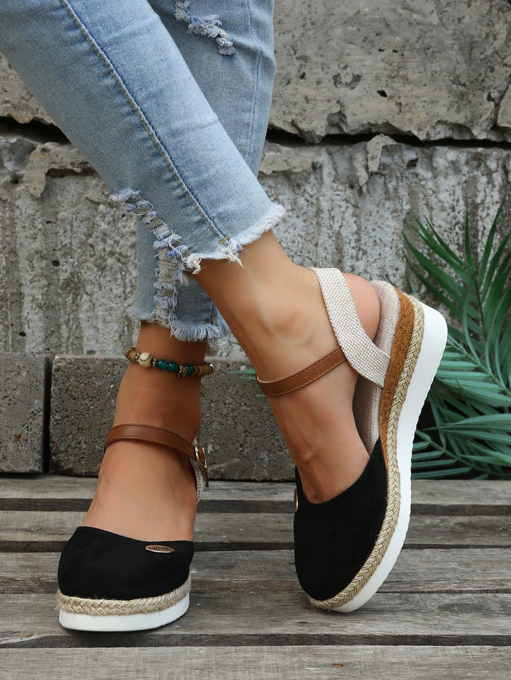 Elegant closed-toe platform espadrille sandals for women. Comfortable chic summer footwear & vacation style.