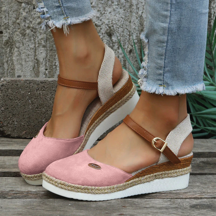 Fashionable women's platform espadrille sandals with a stylish closed toe, perfect for summer and casual wear.