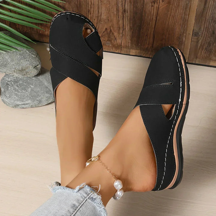 Stylish women's elevated platform sandals with a comfortable wedge heel, perfect for summer outings and versatile fashion.