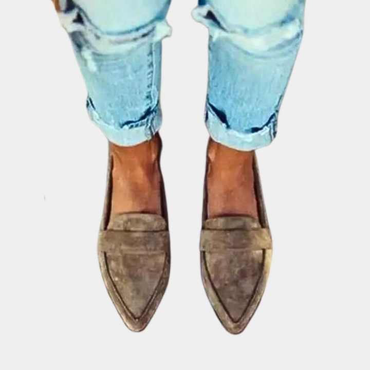 Comfortable women's loafers with a sophisticated pointed toe. Versatile slip-on flats for everyday to business casual.