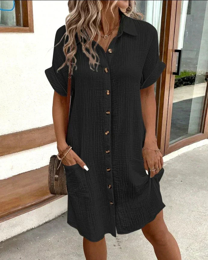 Women's comfortable polo dress featuring button-front, short sleeves, collar & pockets for daily versatile wear.