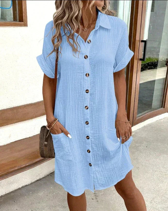 Stylish women's polo dress with a relaxed fit, short sleeves, and classic collar. Perfect above knee summer wear.