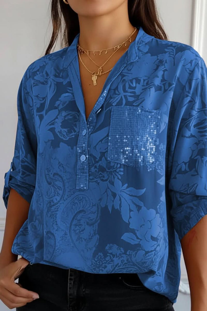 Versatile women's printed blouse with a front pocket, ideal as a chic summer blouse or professional work shirt.