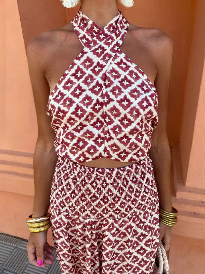 Elegant women's halter maxi wedding guest dress with a chic print, ideal for special occasions & cocktails.