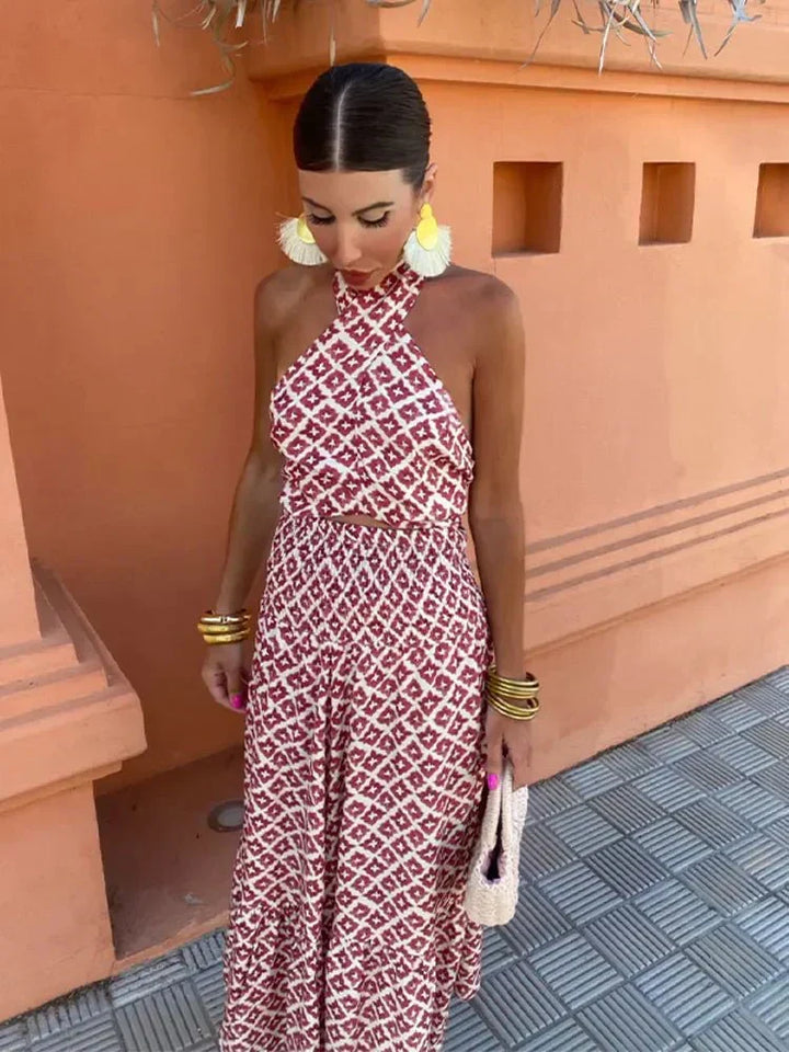 Beautiful women's printed halter maxi dress. Elegant design perfect for wedding guests, parties, or special events.