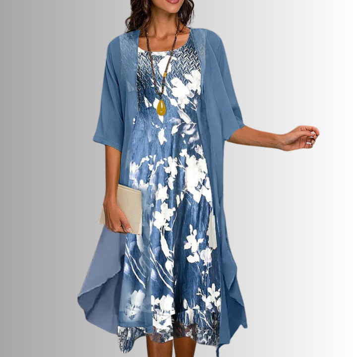 Relaxed fit women's midi dress, colorful print, open-front design. Layered with an uneven hem, perfect for everyday.