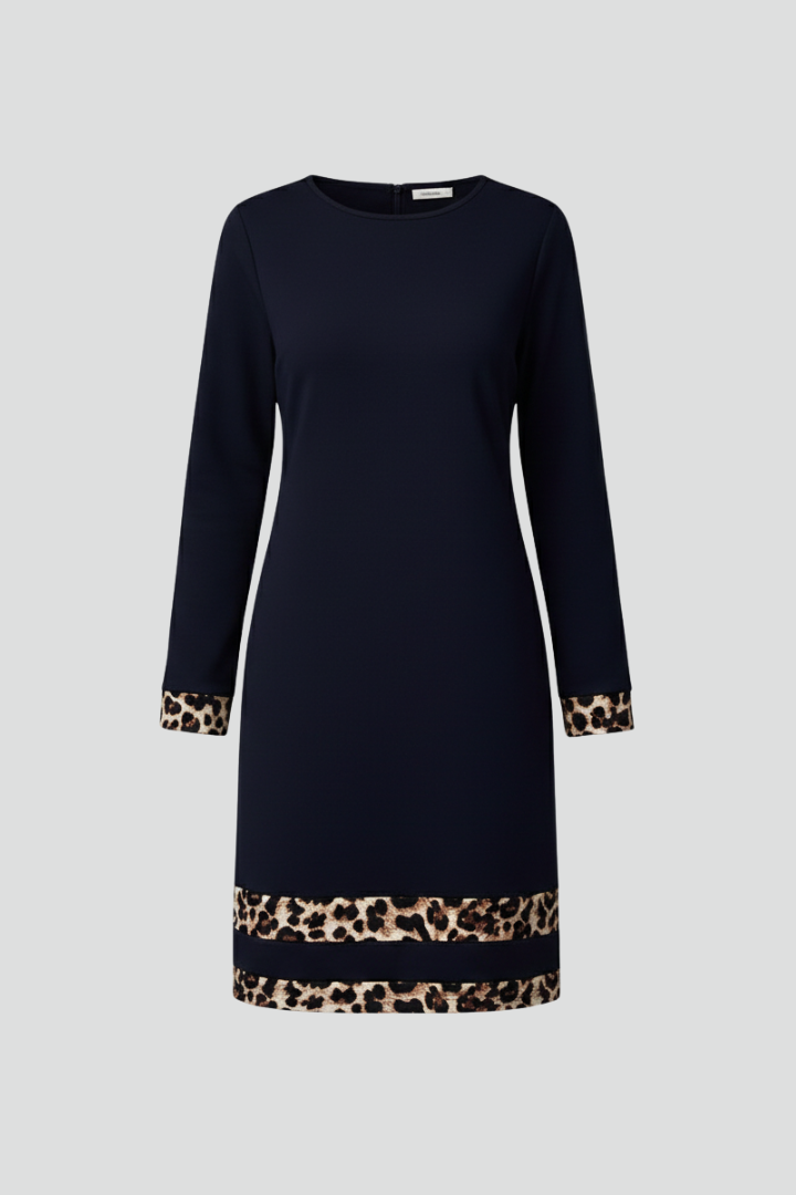 Chic women's short dress with elegant long sleeves and a stylish patterned hem, perfect for casual or everyday wear.
