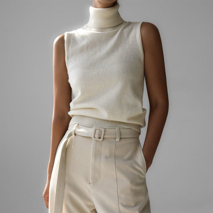 Chic women's sleeveless mock neck top for effortless elegant style. Ideal for summer or office.