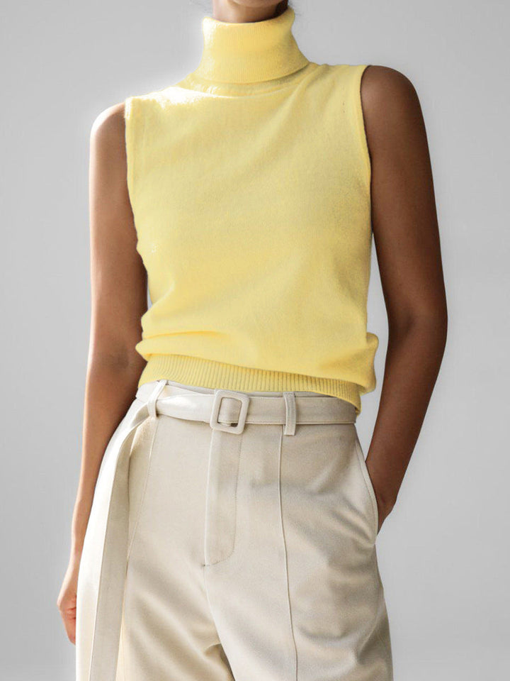 Stylish women's sleeveless mock neck top, designed for a sleek silhouette and sophisticated look.