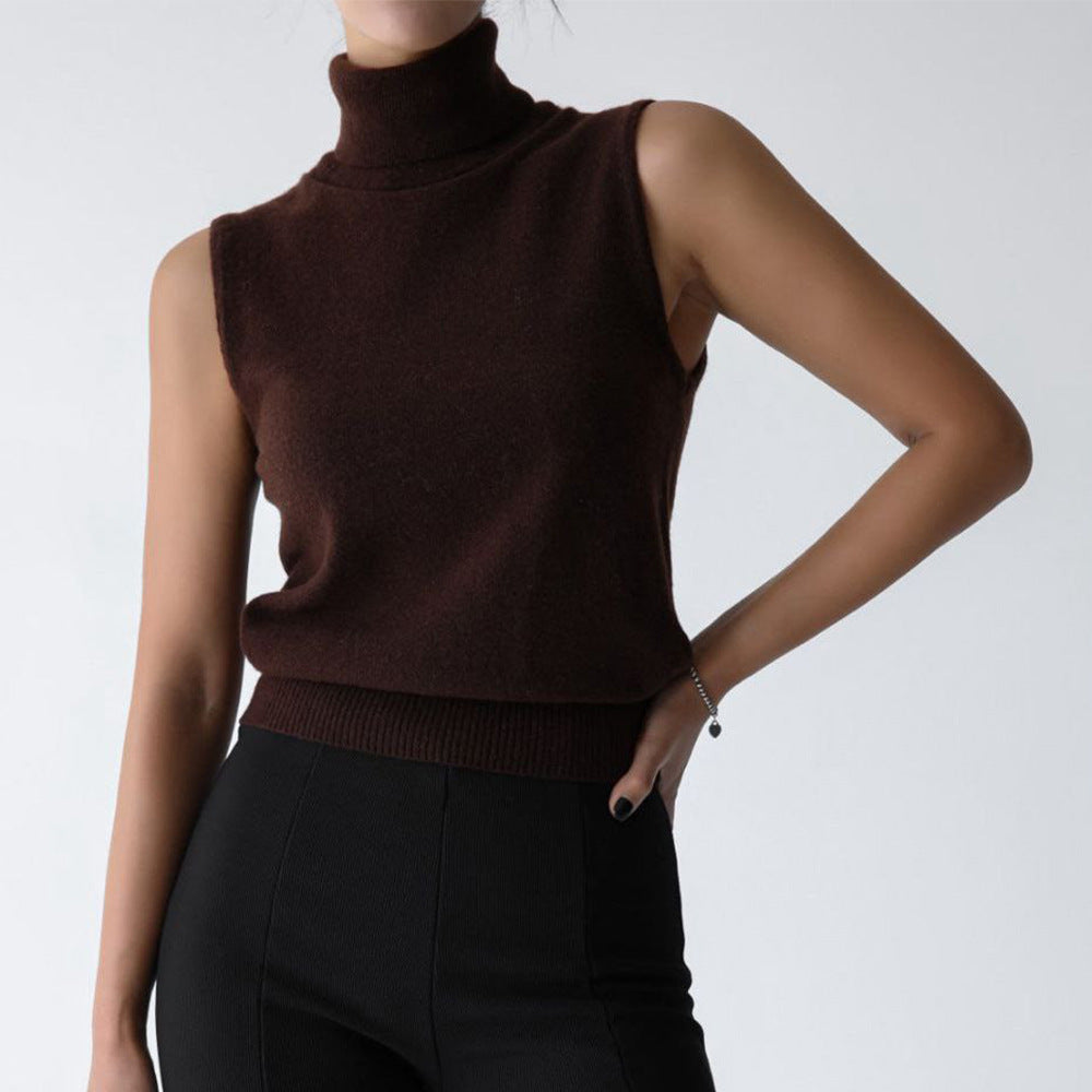 Women's mock neck sleeveless top in a solid color, ideal for versatile styling and office wear.
