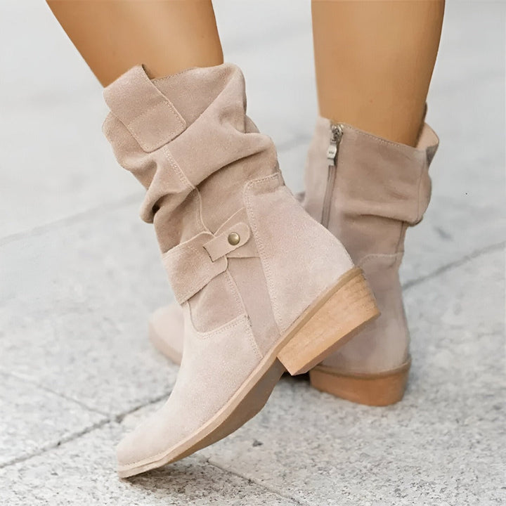 Comfortable women's slouchy ankle boots with low heel, ideal for everyday casual wear & winter style.